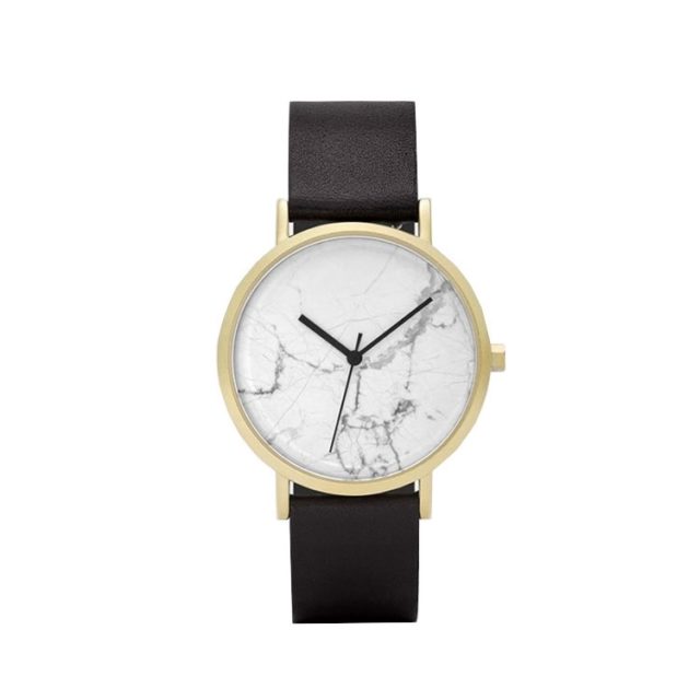 gold case black leahter strap white marble watch